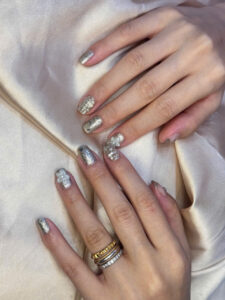 Silver crystal floral nails at Fame Nails District 7